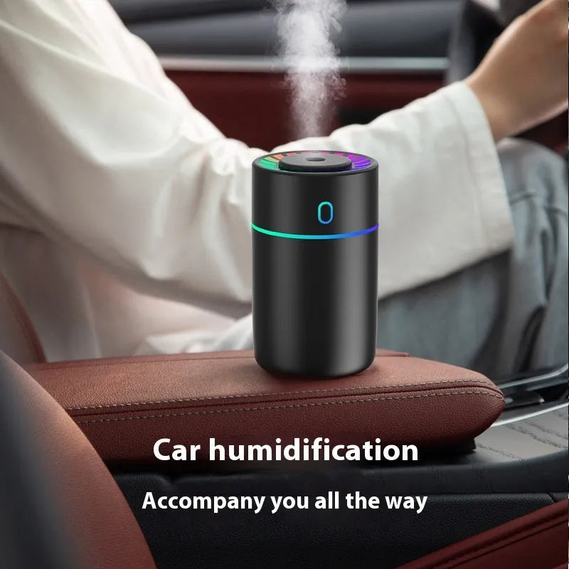 Magic Light USB humidifier in white, pink, or black, round plastic body, heavy fog, for car or desktop use under 10 square metres