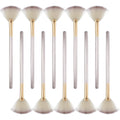 Set of 10 champagne-coloured facial fan brushes with wooden handles on a white background.
