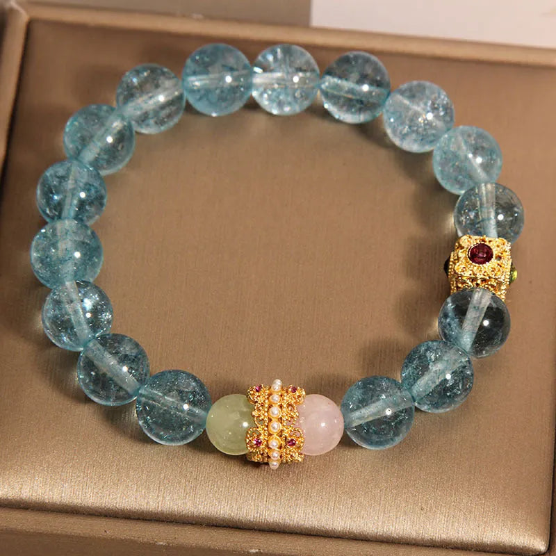 Women's Chinese style crystal bracelet with blue cube sugar beads and colourful stones on flexible ring