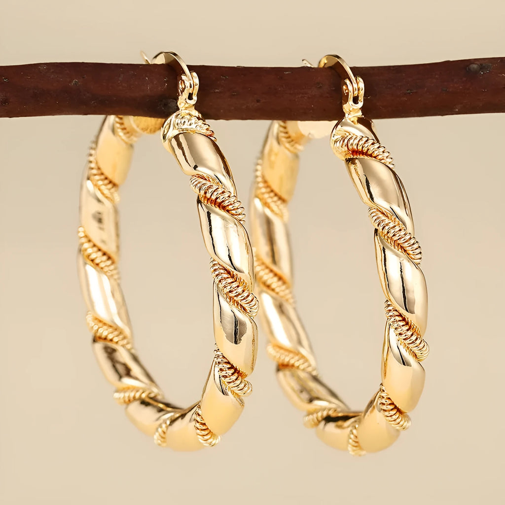 Geometric copper earrings with ring and line design elements in golden finish for women