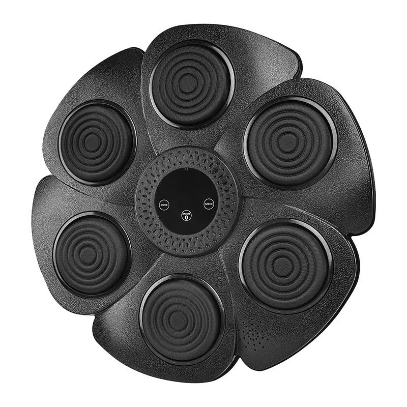 Black smart boxing wall target with LED lights and half-finger gloves on a wall for indoor training.