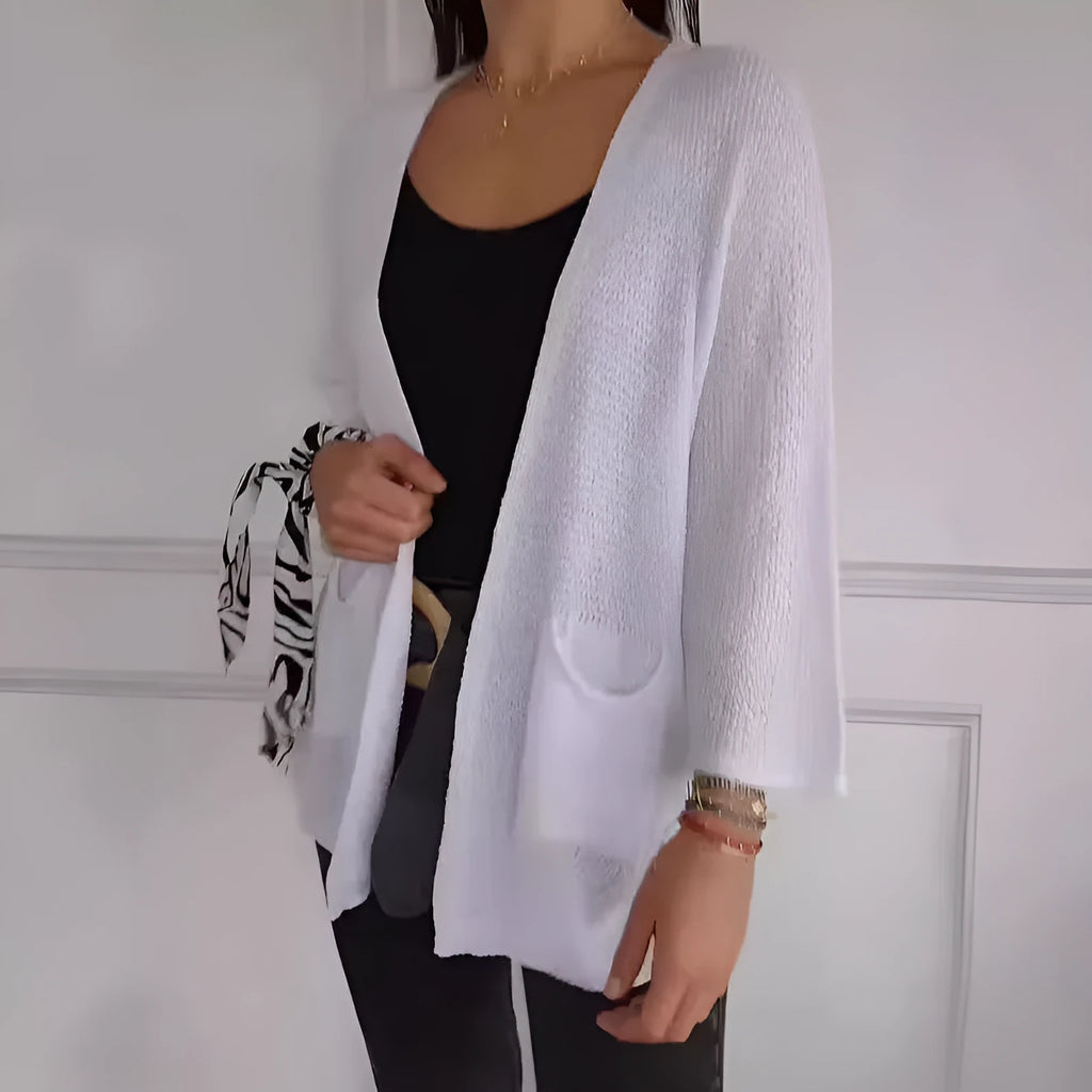 Women's waffle texture cardigan coat with nine-quarter sleeves in army green colour showing side pockets