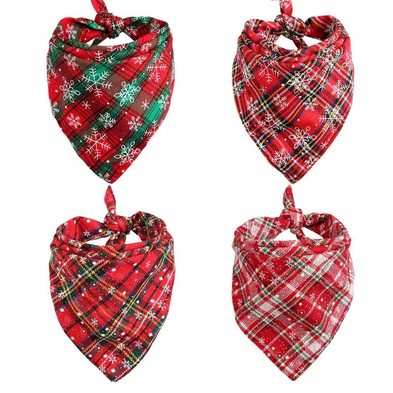 Cotton triangular dog scarf with plaid pattern in Christmas colours, 44x44cm, placed on a dog