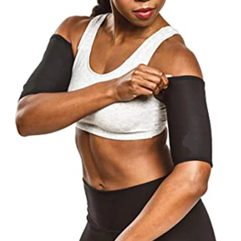 Adjustable arm sweatband in blue on a gym background, showing the binding strap.