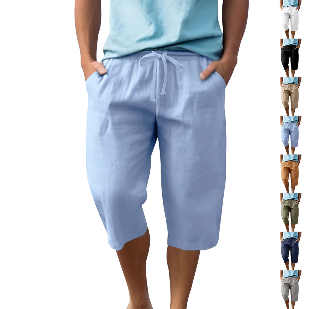 Men's solid colour linen shorts with a drawstring waist shown in a light blue shade.