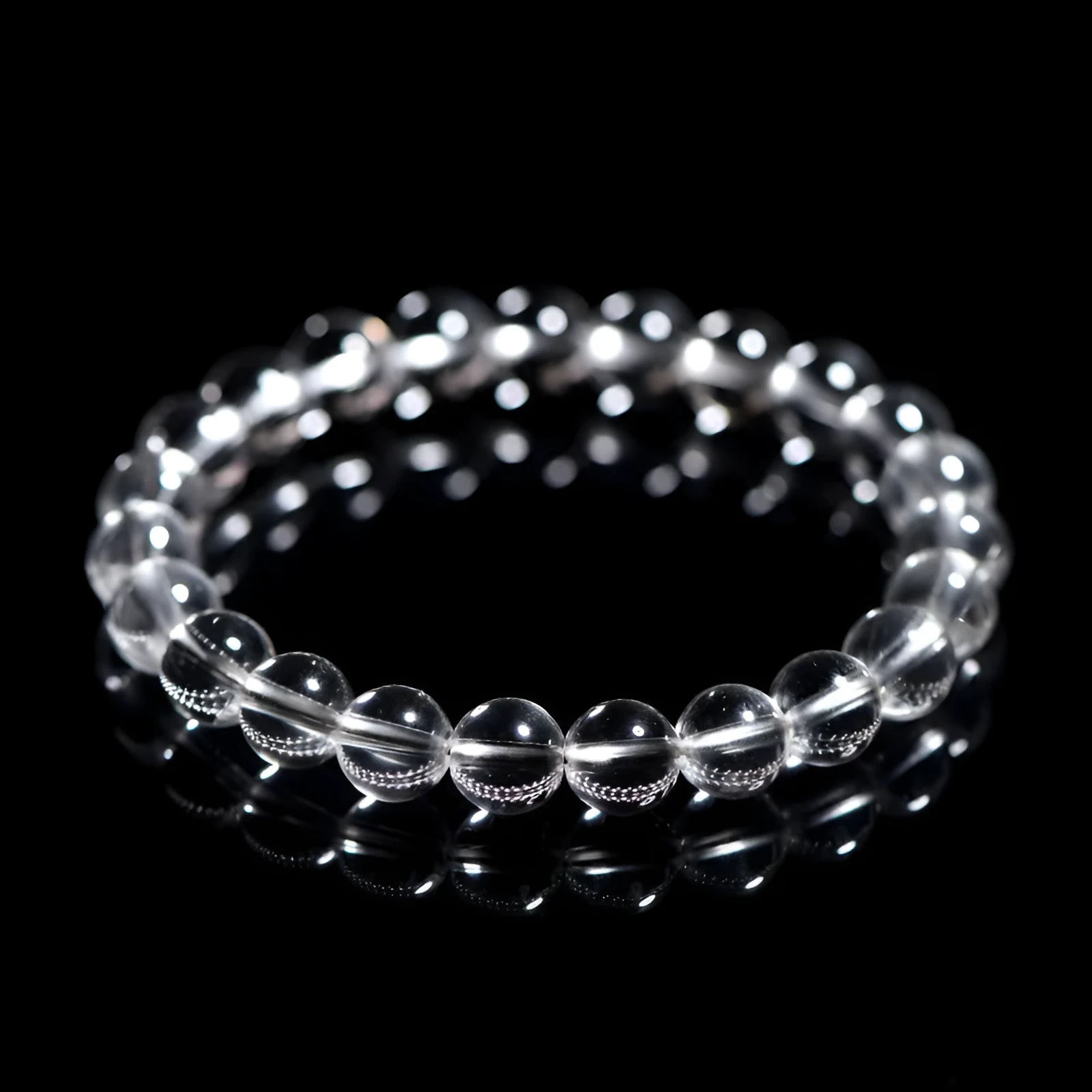 Natural Donghai old materials white water round bead crystal bracelet in old mine white on a wrist.