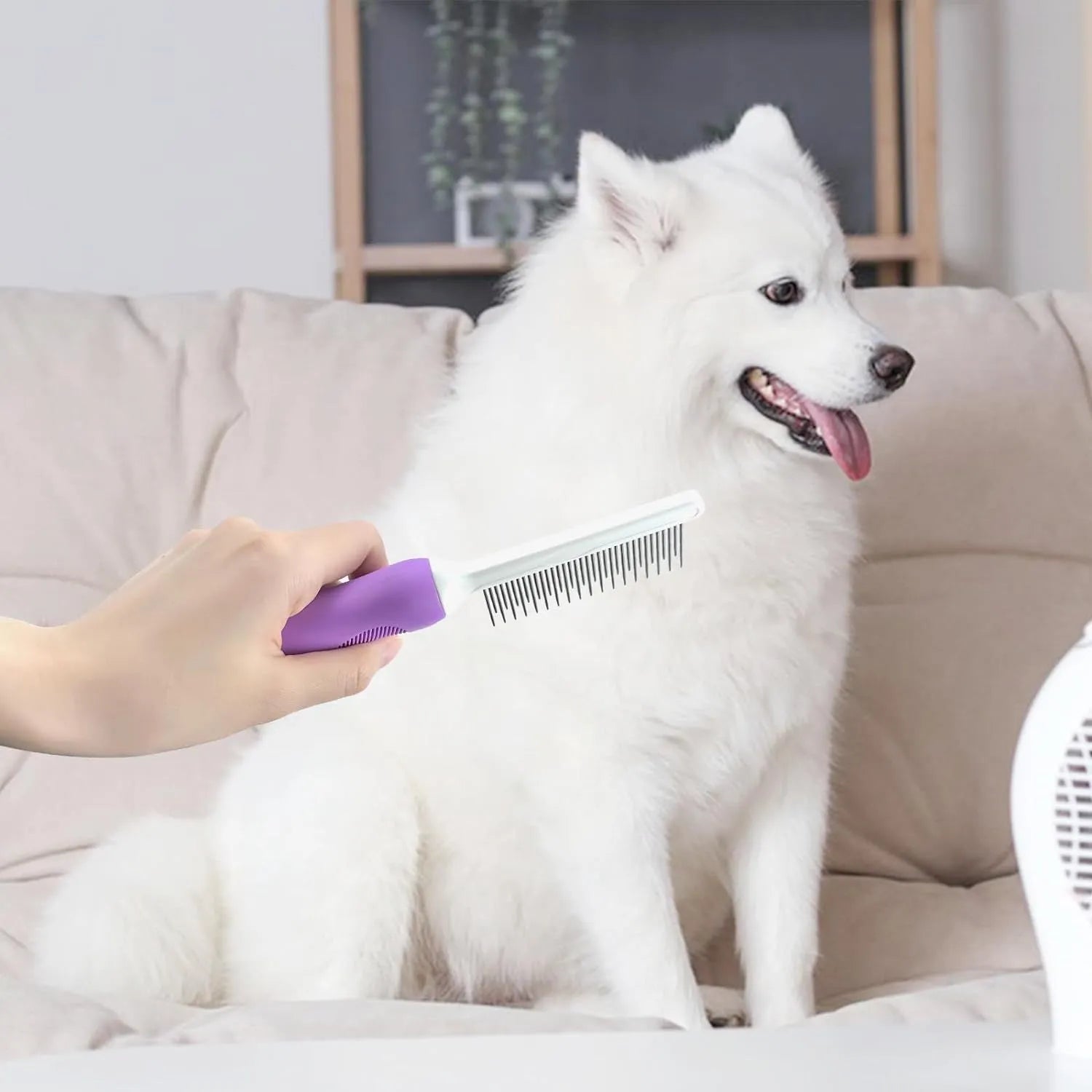 Purple pet detangling comb with stainless steel long and short teeth on an ergonomic handle.
