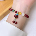 Birth year red beaded cinnabar bracelet with peace buckle gourd pendant in Chinese style for women