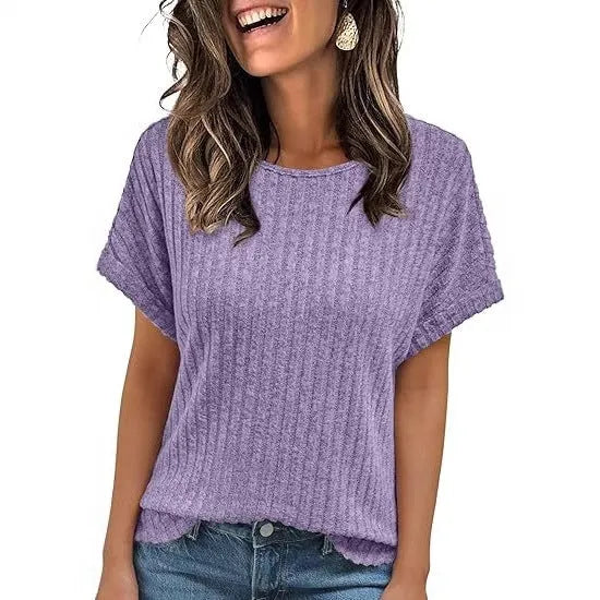 Women's loose fit short-sleeved t-shirt with round neck and sunken stripe detail, solid colour, front view