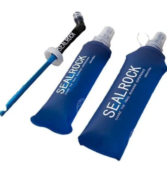 Flexible plastic suction straw with silicone mouthpiece, shown extended and collapsed next to a cycling water bottle.