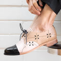 Women's round head flat casual pumps in black and white apricot colour with burnt flower pattern