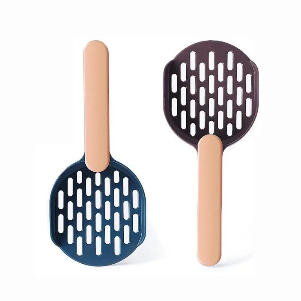 Blue plastic cat litter shovel scoop for cleaning litter boxes, shown next to a litter tray.
