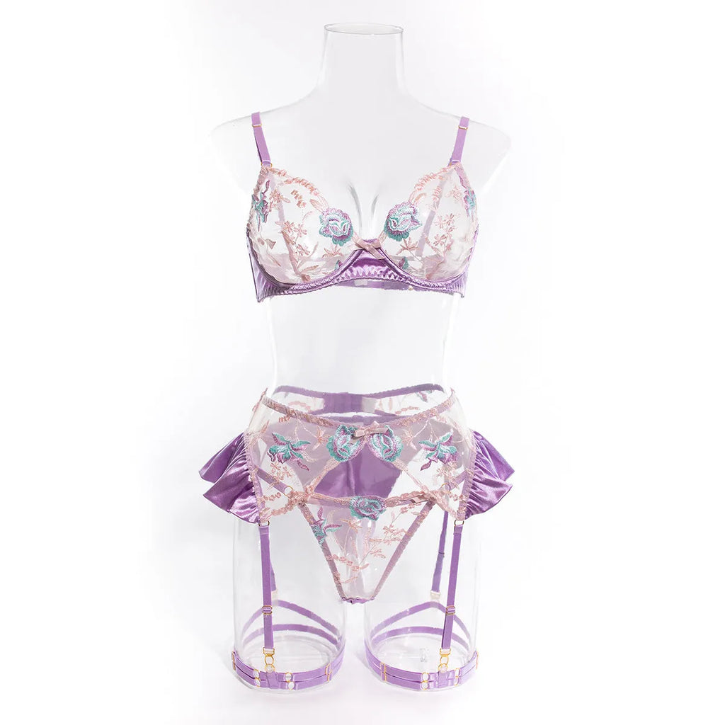 Light purple satin four-piece lingerie set showing all components with champagne colour option