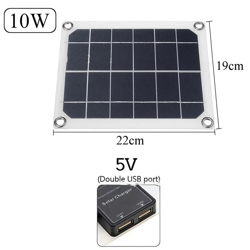 Black portable solar panel with dual USB ports for outdoor charging of mobile phones and tablets.