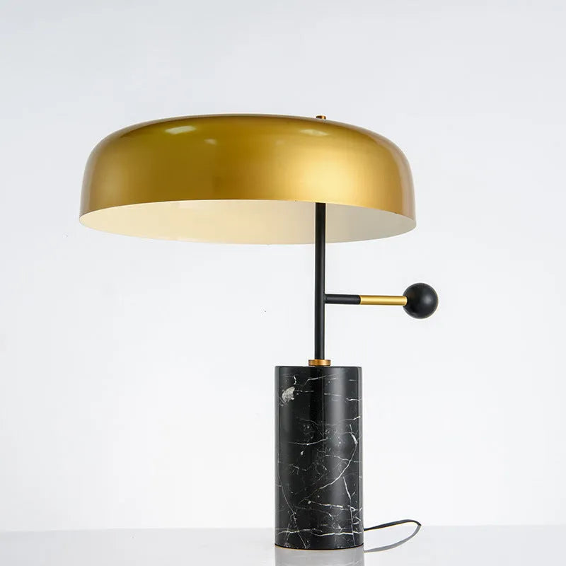 European-style bedside table lamp with warm white lighting on wooden surface