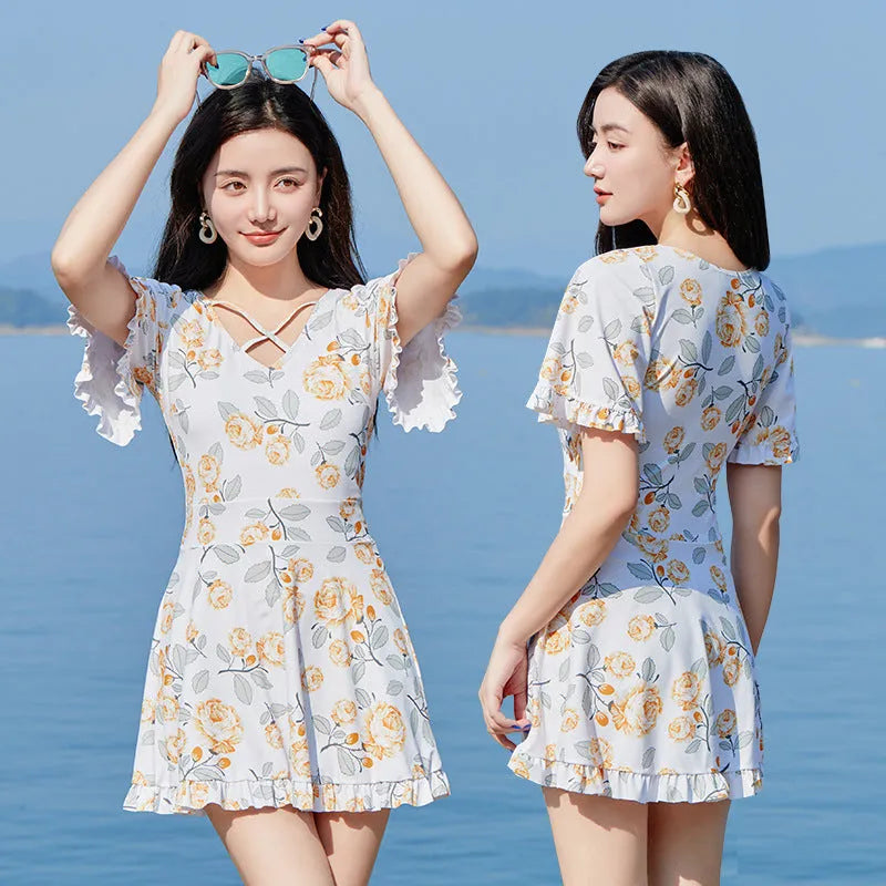 Women's high waist floral print one-piece swimsuit in blue pattern or white flower colours