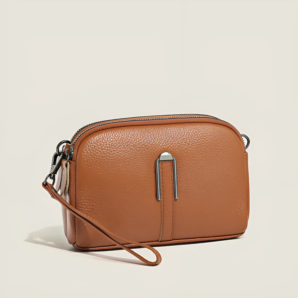 Minimalist top-grain leather crossbody bag in khaki with splicing detail and inner pockets