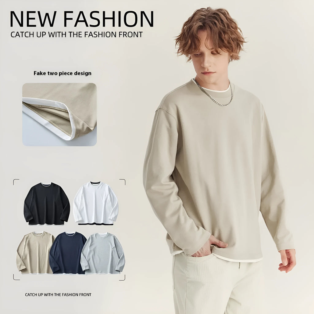 Man wearing a loose fit long-sleeved round neck t-shirt in a solid colour