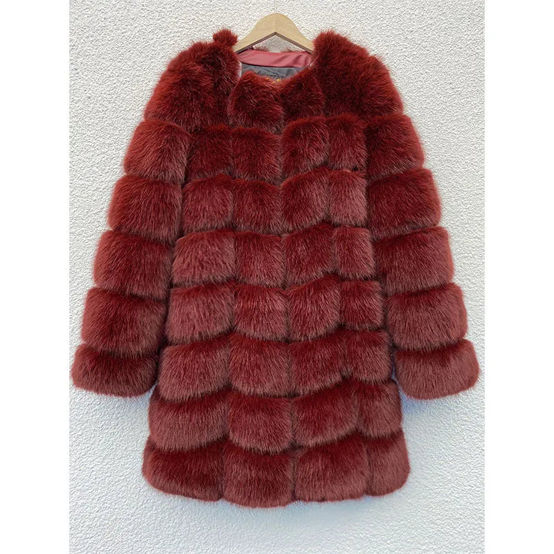 Women's long black artificial fur coat with regular sleeves on a hanger.