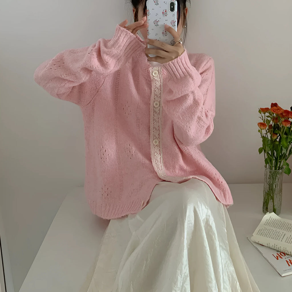 Artistic retro loose-fit sweater coat cardigan in apricot, shown on a model.