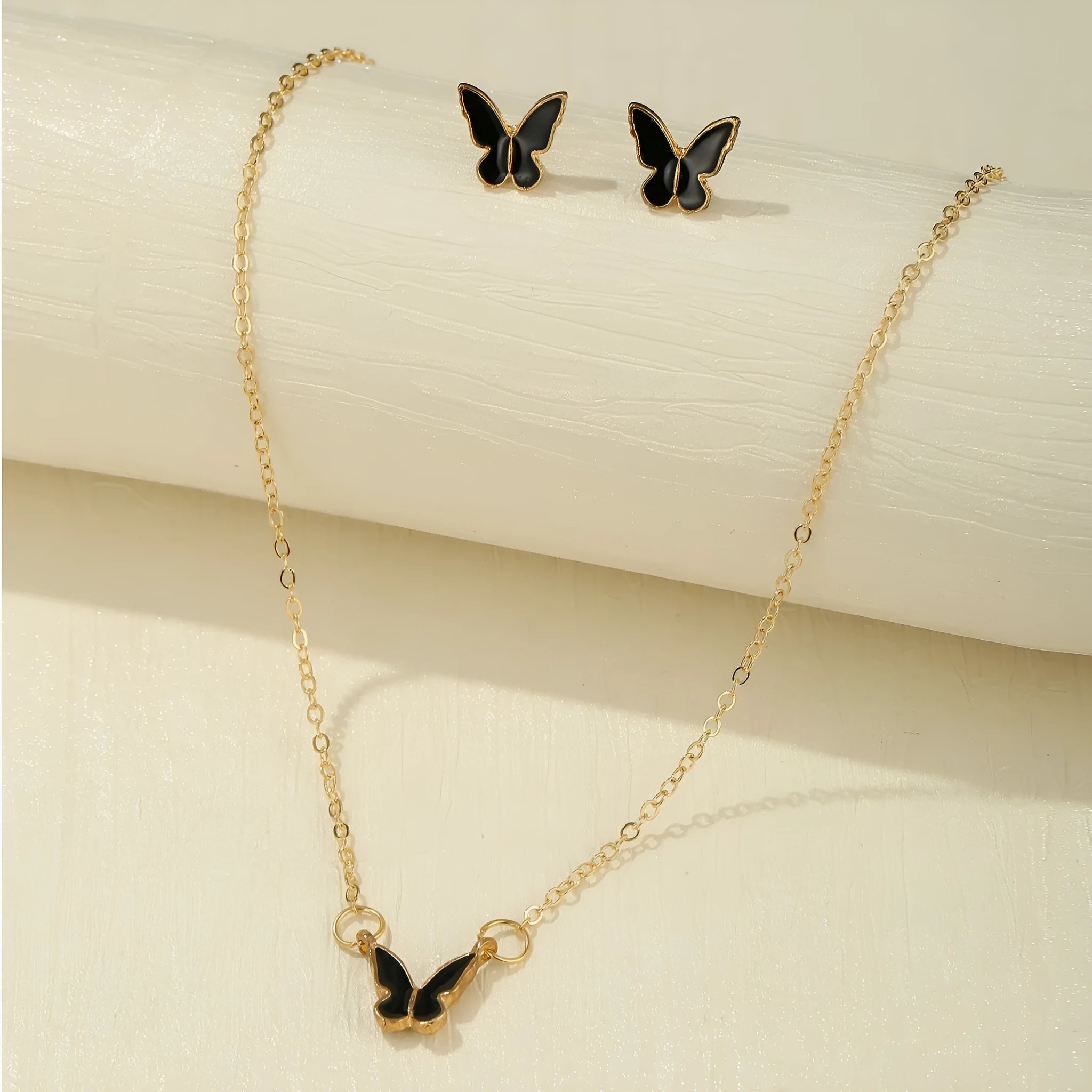 Butterfly jewelry set with alloy pendant and electroplated finish in a geometric retro simplicity design