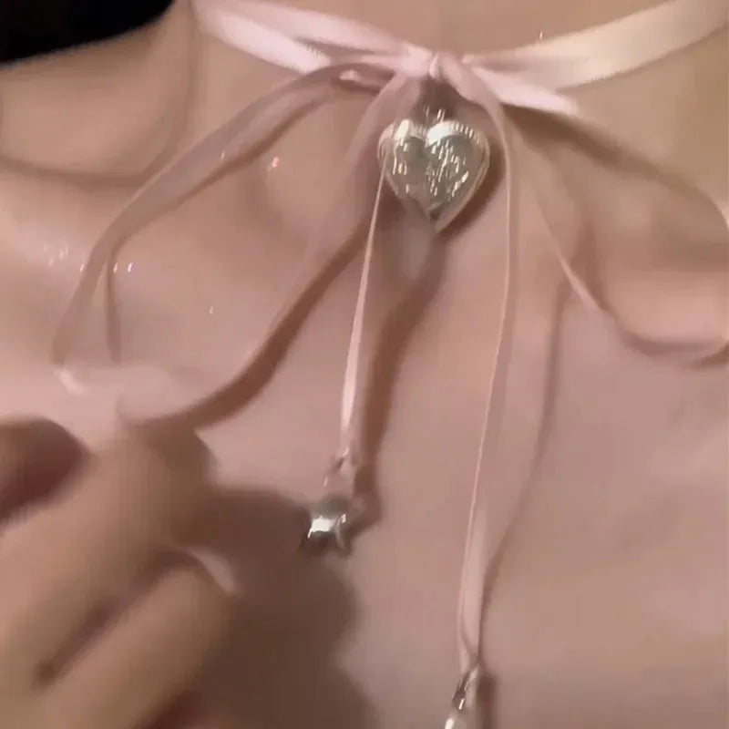 Women's silver-tone alloy necklace with ribbon love pendant on clavicle chain
