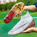 High-top synthetic leather football training shoes with gold-coloured PVC sole on artificial grass