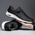 Black and white low-top men's tennis shoes with mesh upper and cross shoulder straps