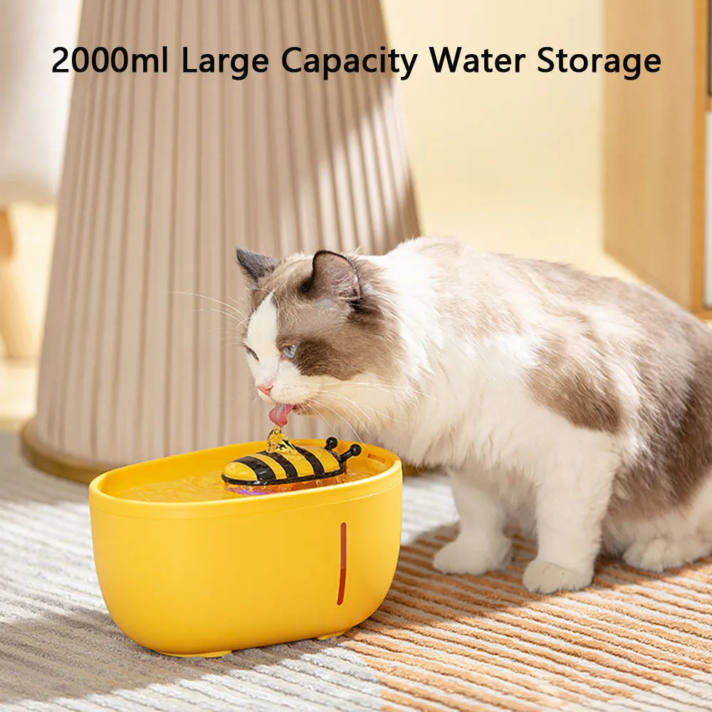 Yellow cat water fountain with filtration system and USB cable for automatic recirculating pet water