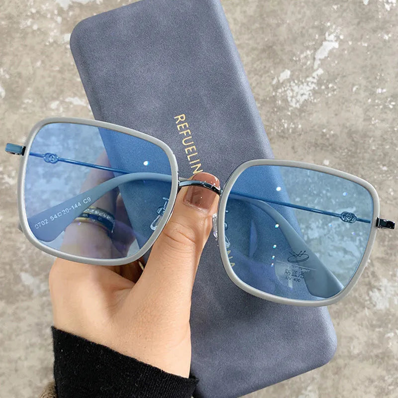 Photochromic myopia glasses with large frame, anti-blue light lens, and Black Gold frame colour options