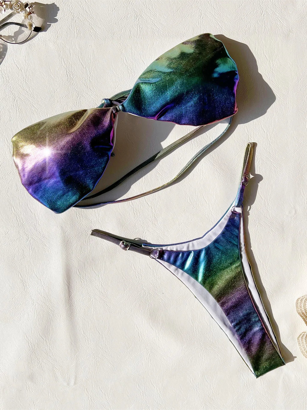 Women's gradient purple polyester bikini swimsuit top and bottom set.