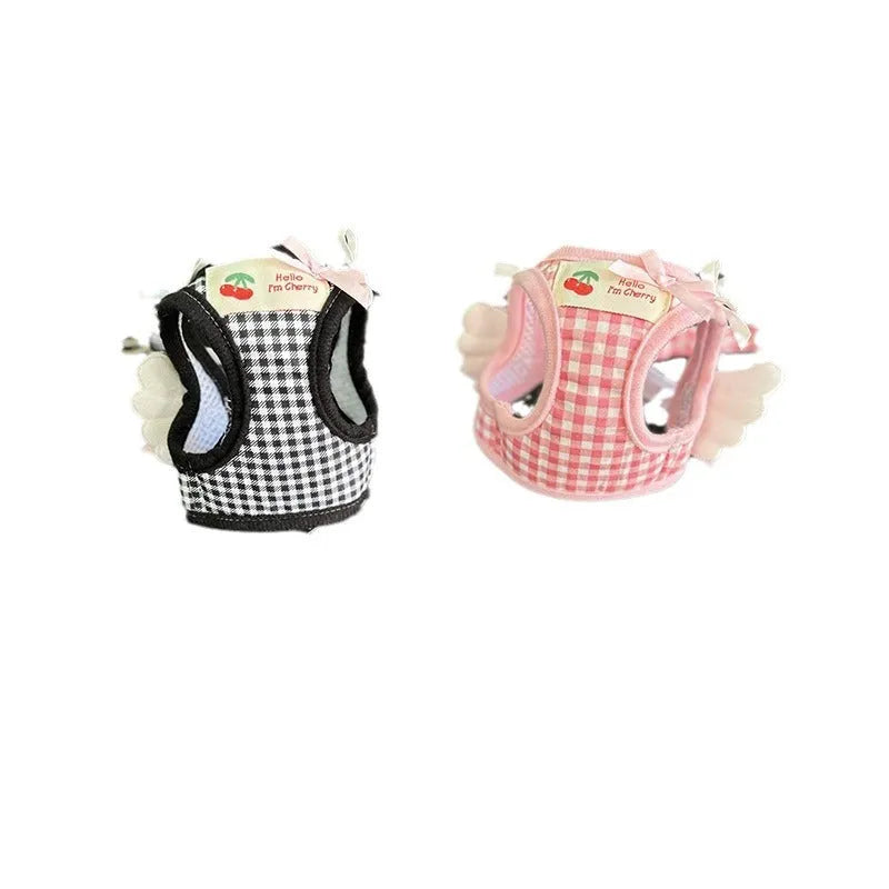 Pink cotton chest and back dog harness with lead for a small dog, size label shown.