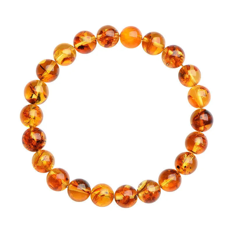 Natural yellow piebald amber bracelet with flower spot patterning and geometric design