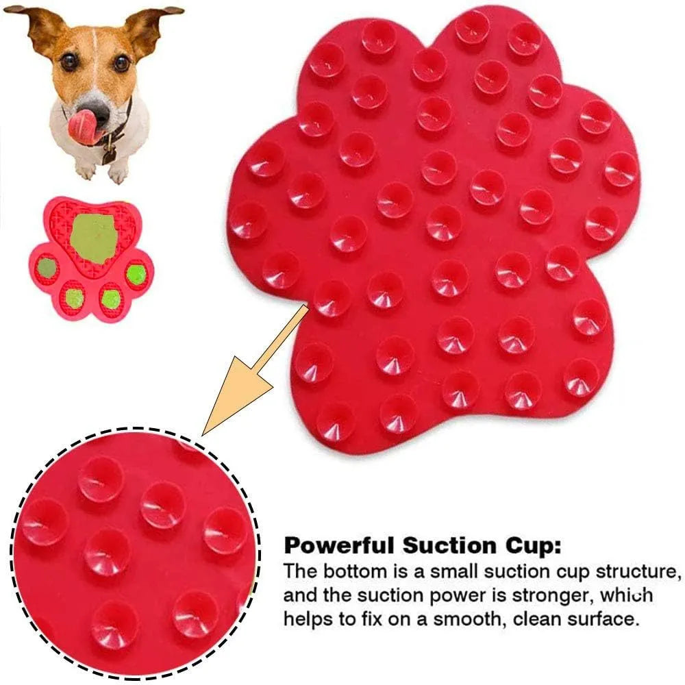 Blue bone-shaped silicone dog licking mat with suction cups on back for wall mounting during bathing.