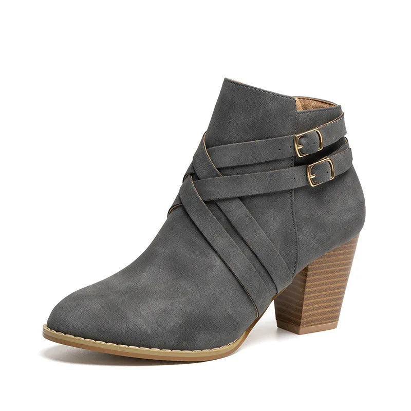 Grey PU leather short ankle boots with a side zipper, buckle strap, and a chunky 7cm heel.