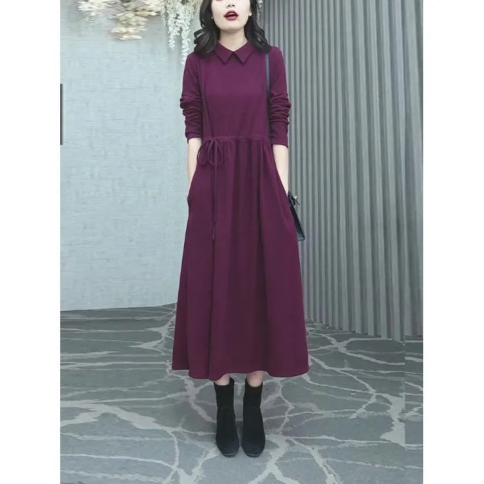 A purplish red plus size women's long sleeve dress with a long skirt for autumn and winter.
