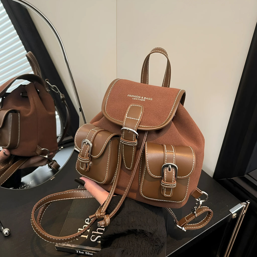 Fashionable all-match PU clamshell backpack in black with contrast stitching, daily commuter bag