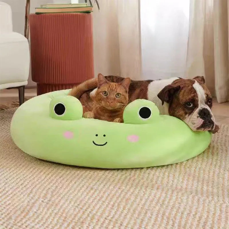 Large Squishmallows plush pet bed in green with bolster edges and non-skid bottom on floor