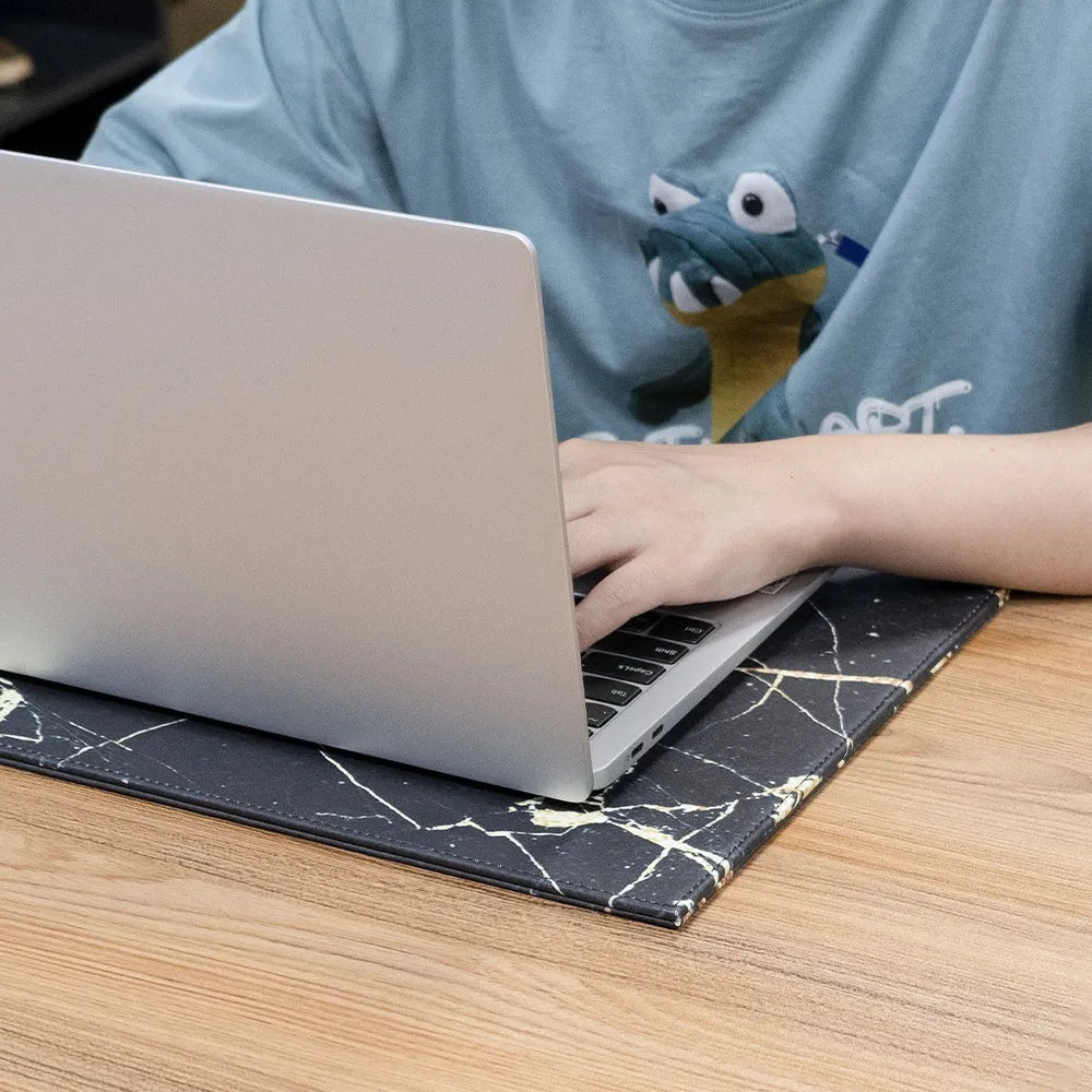 Durable heat-insulating anti-radiation mat for tablets in black, black gold, blue, and green colour options.