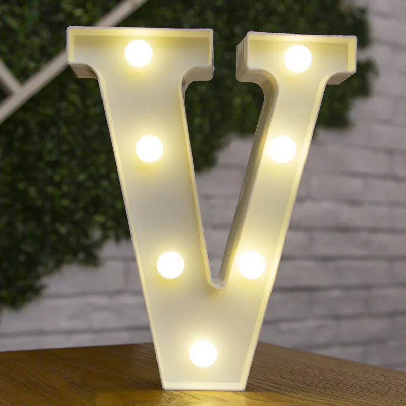 White plastic LED marquee letter sign with warm white glow, 22cm tall