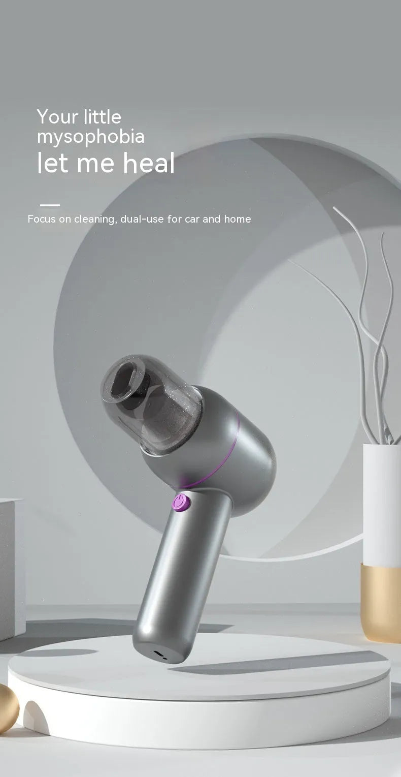 Portable handheld car cleaner vacuum in grey with brush nozzle and extended suction nozzle attachments