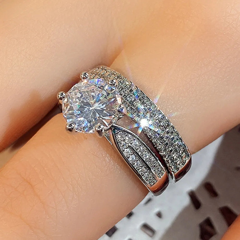White gold coloured alloy wedding ring bracelet with geometric design and round elements on size chart