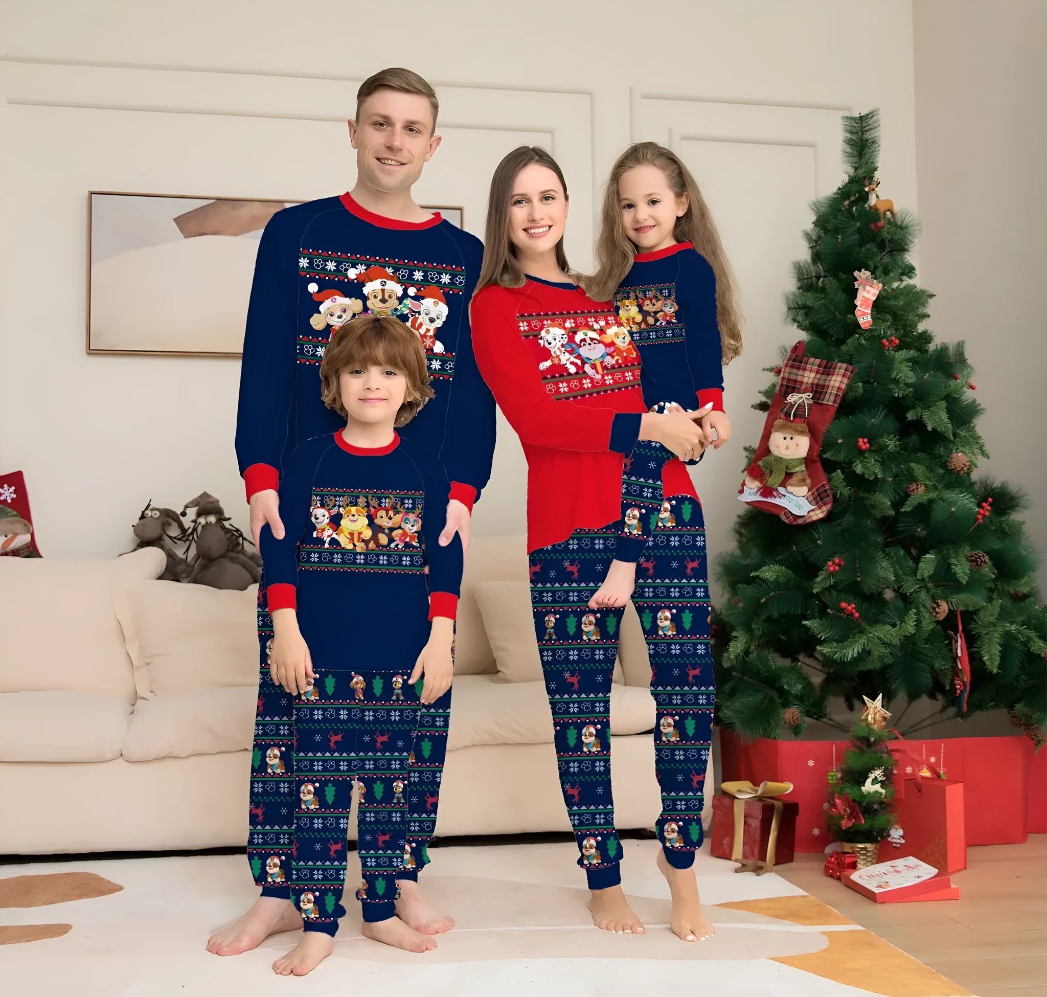 Red plaid family pyjamas set with cartoon deer print for adults, children, baby, and dog.