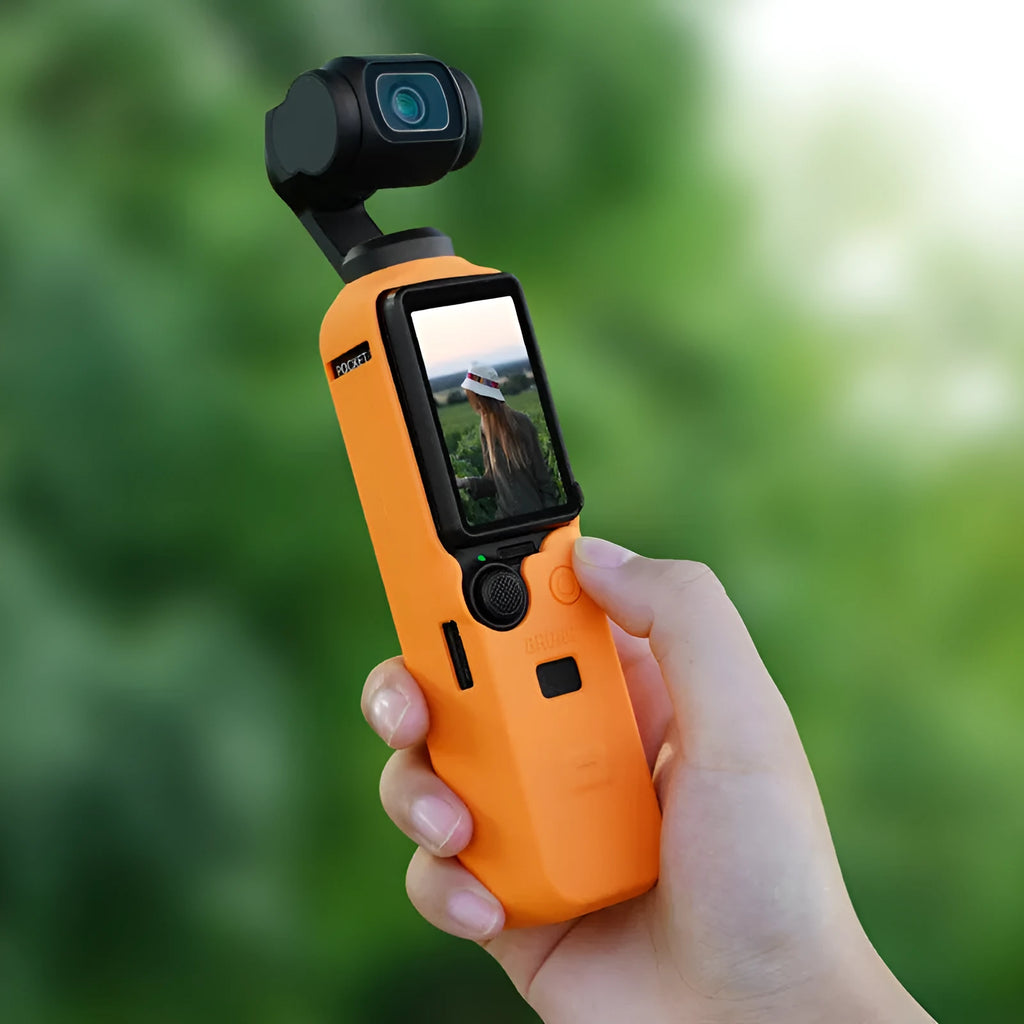 Black, red, and orange silicone protective sleeves for PTZ camera bodies in small and medium sizes
