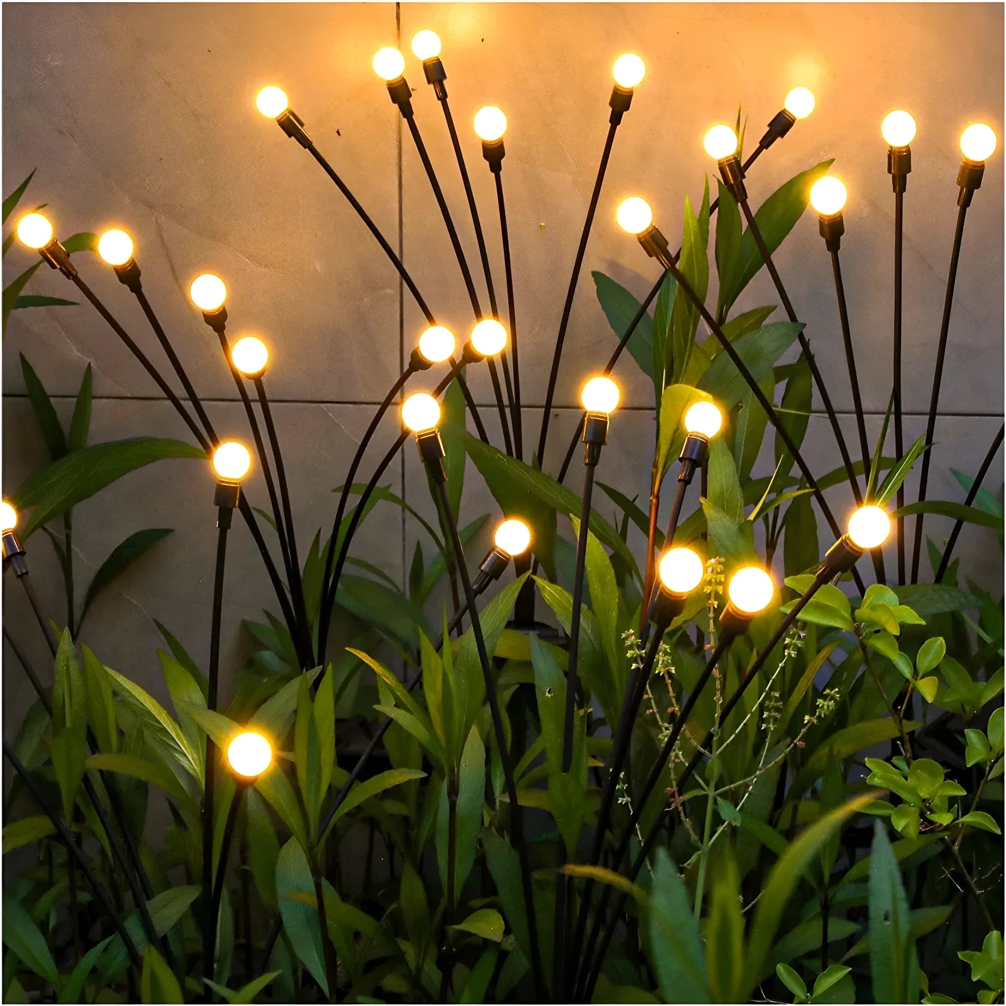 Solar-powered LED garden ground light with multiple light heads and a pneumatic foot pedal for installation.