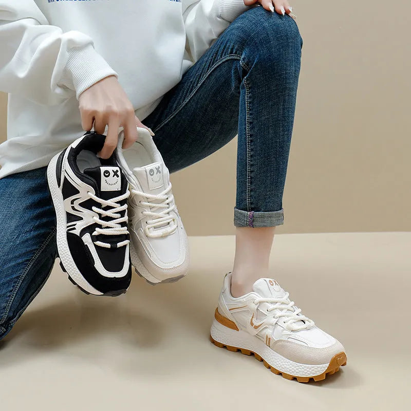 Women's solid colour platform casual shoes with lace-up front and round toe in black, grey, or khaki.
