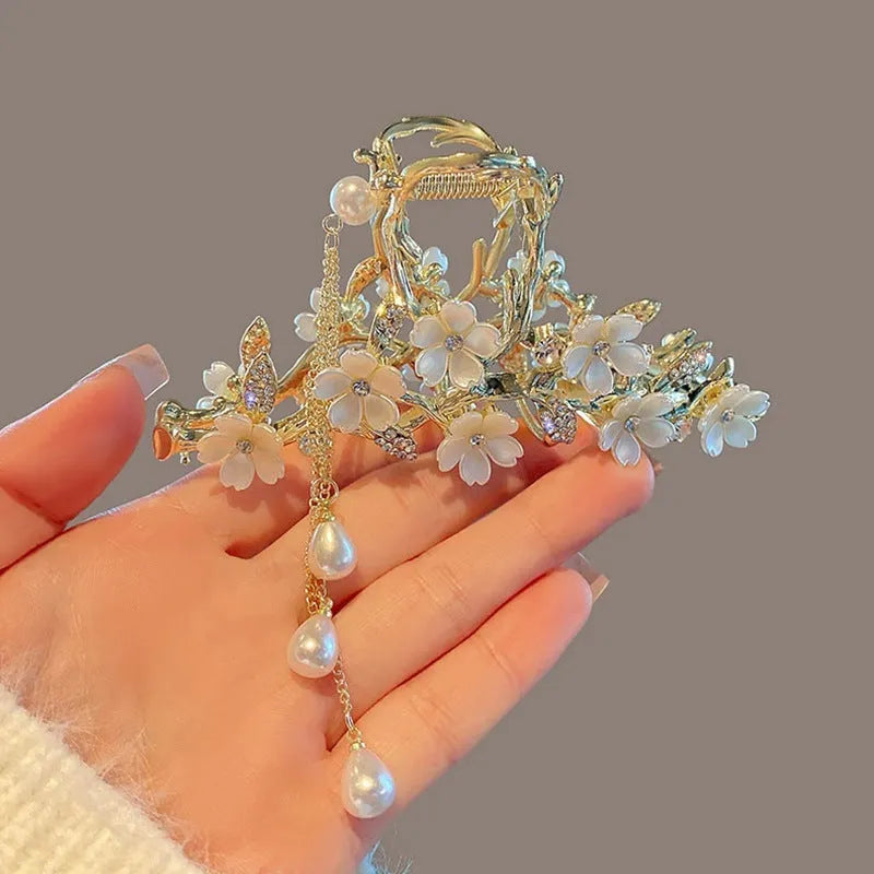 Large metal hair clip with pearl and diamond inlay, bell orchid tassel pendant, approximately 11.5cm length