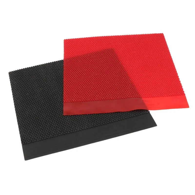Single sheet of black and red raw table tennis rubber with a small particle surface.