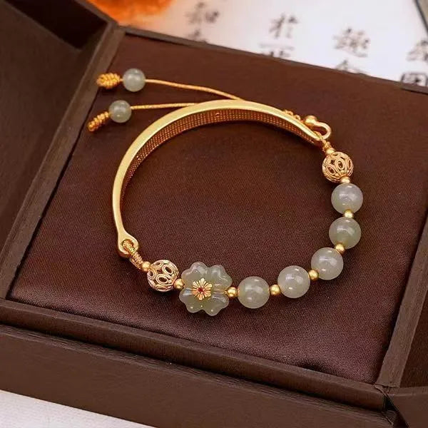 Fashion antiquity hydrangea adjustable bracelet with coloured glaze beads and rabbit pendant on white background