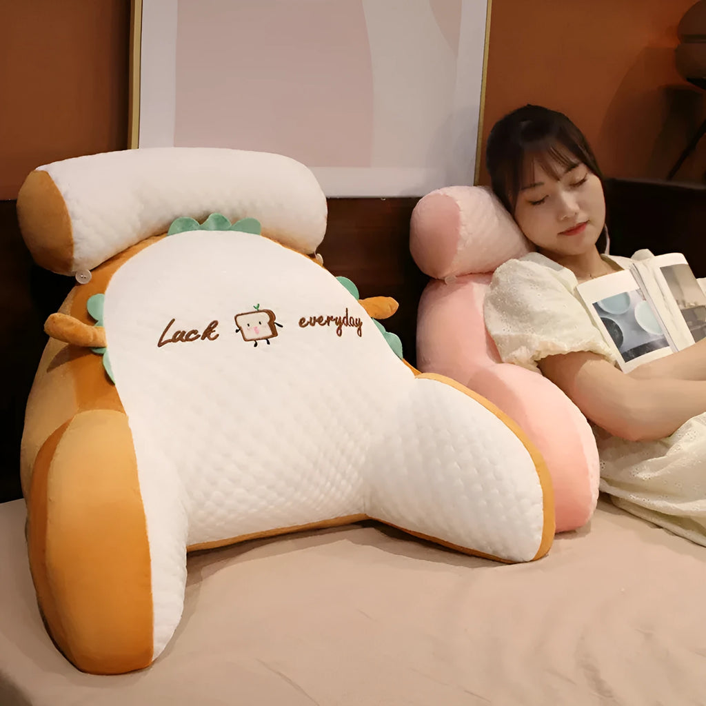 Large triangle reading cushion with ergonomic back support and embroidered ice bean pattern